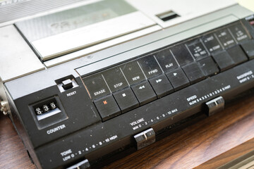 A classics style analog cassette player or sound recording device. Technology and equipment object...