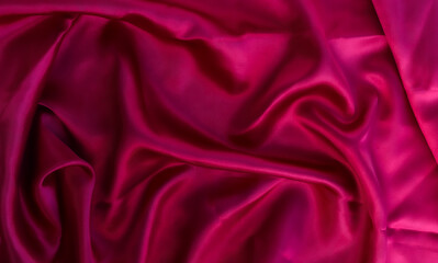 Elegant red silk or elegant satin can be used as a background.