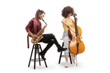 Two young women playing a cello and a sax