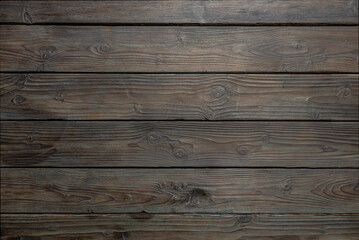 Naklejka premium abstract background of an old brown wooden texture close up
