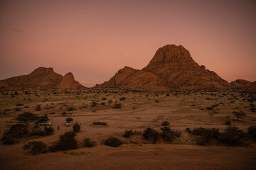 Fototapeta na wymiar Camping near Spitzkoppe mountain in sunrise, Namibia, Africa