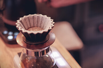 Coffee shop concept : Barista hand drip coffee on counter