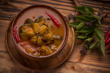 Catfish Curry. Thai food on dark background. Traditional food concept. Top View, Flat Lay, Copy Space