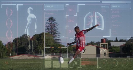 Animation of screen with biological data over biracial male soccer player during training - Powered by Adobe