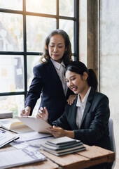 Business meeting. The senior manager talks to the staff in the conference room and discuss the company's personnel development coaching during the meeting.