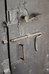 Deadbolt on ancient wooden door