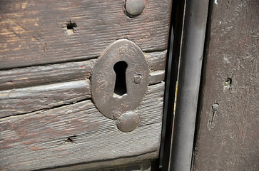 Lock on ancient wooden door