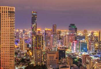 Fototapeta na wymiar the Cityscape, the Skyscrapers and the Buildings of Bangkok Thailand Southeast Asia in the Night Time 