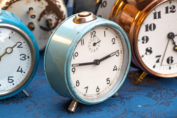 An old alarm clock on a flea market in Italy.