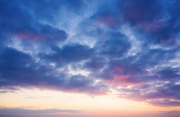 Naklejka na ściany i meble Beautiful evening sky with clouds at dusk . Sunset sky background.
