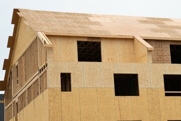 walls and roof of an unfinished new plywood house