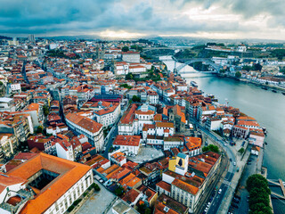 Obraz premium Porto Portugal Aerial View. Dom Luis Bridge at Sunrise. Porto, Portugal. Cityscape of Downtown Touristic Ribeira. Olt Town. Douro River.