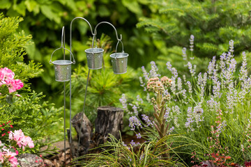 Three metal buckets decoration for landscaping