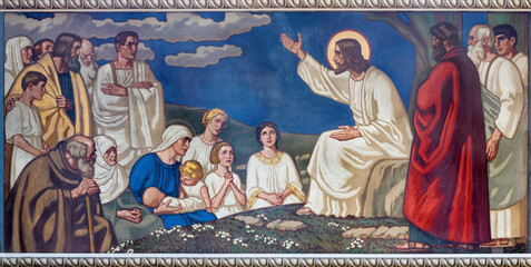 ZURICH, SWITZERLAND - JULY 1, 2022: The fresco of Jesus at the Sermon on the Mount Pfarrkirche...