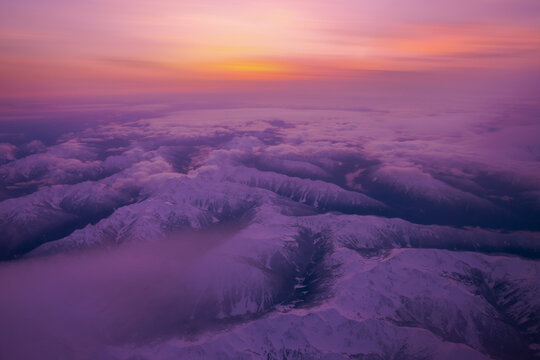 Aerial View Of Snowy Mountains Over Washington State ,United States