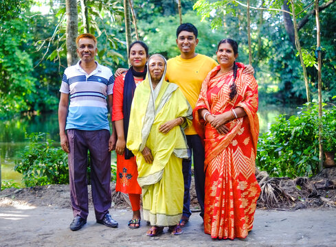 Bangladeshi Family Photo, South Asian Hindu Religious Nuclear Family In Natural Environment, Group Of People In Traditional Dress