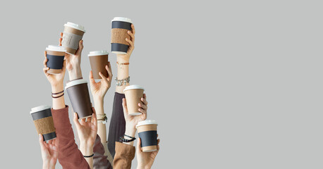 Many different arms raised up holding coffee cup - Powered by Adobe