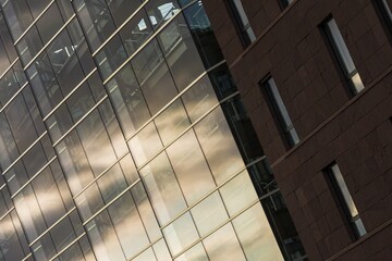 Detail of modern architecture buildings. Symbol of real estate, business, prosperity. Beautiful sunny day.