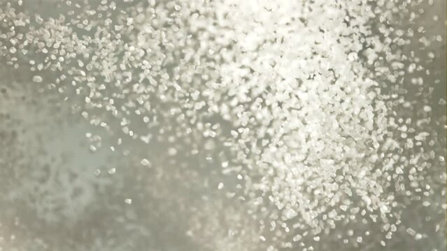Sugar rise up. Top view. The texture of sugar. Filmed is slow motion 1000 fps.