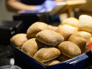many ciabattas in food tray in canteen