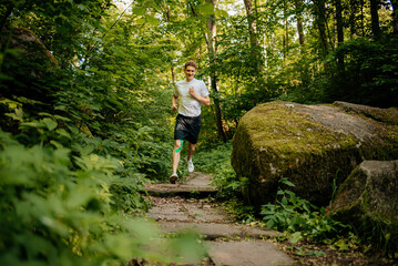 Man jogging in the forest