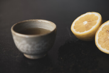 Korean tea cup with lemon and loose leaf tea