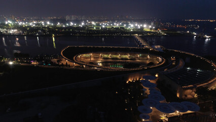 Top view on Fountains in the Park in Singapore. Shot. Singapore city skyline at night and view of...