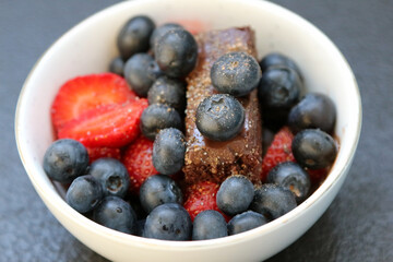 Chocolate cake, strawberries and blueberries