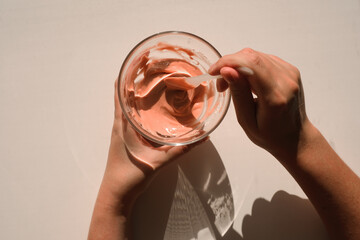 woman making alginate mask at home homemade skin care procedures