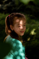 A little girl with spring flowers.