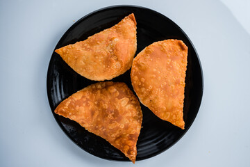 chebureks on a plate top view