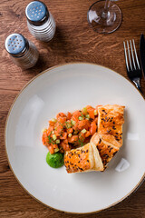 Slices of salmon tartare Served with Spicy Sauce