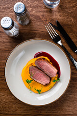 duck fillet with carrot puree in Luxury Restaurant for Dinner