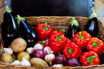 Wicker basket with vegetables. Autumn. Harvest.