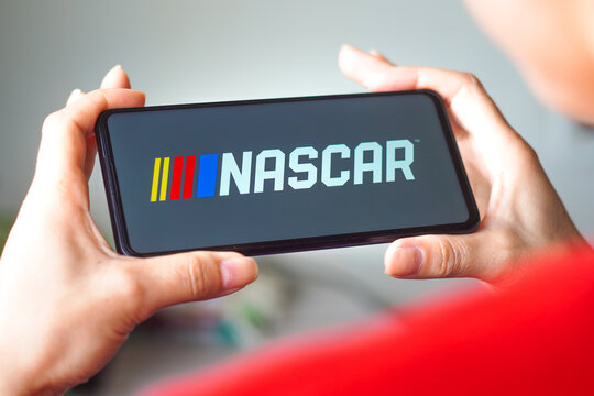 July 29, 2022, Brazil. In this photo illustration, the National Association for Stock Car Auto Racing (NASCAR) logo is displayed on a smartphone screen.