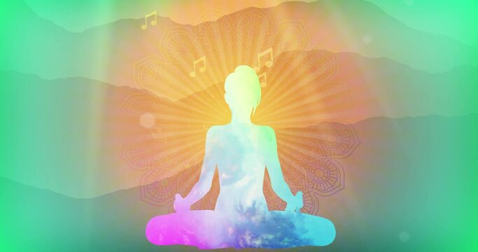 A silhouette of a woman in a lotus position against a mystical pastel background
