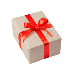Gift box in craft paper with red bow isolated on white background.