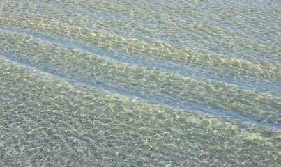 Clean, clear, calm waters of the Gulf of Mexico on Fort Myers Beach, Florida.
