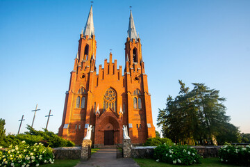 Fototapeta na wymiar Church of the Holy Trinity Church in Vidzy, Belarus . Old catholic cathedral neo gothic style.