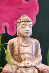 carved wood Buddha