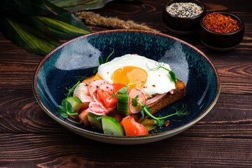 Toast with fried egg, bacon Delicious breakfast