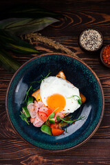 Toast with fried egg, bacon Delicious breakfast