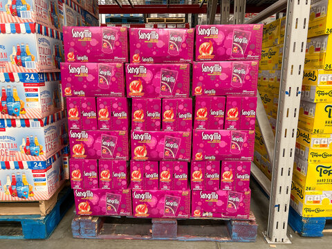 Cases of pouches of Sangriiia Rum, Acai and other natural juices Spiked Sparkling drinks at a Sams Club grocery store waiting for customers to purchase.