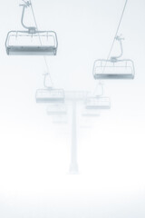 ski lift in snow blizzard 