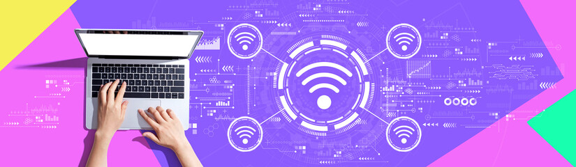 Wifi theme with person using a laptop computer