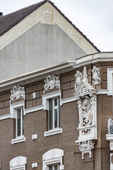 Obraz premium classic european architecture detail of the facade of a building