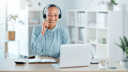 Happy call center agent calling, talking and doing online sales with a laptop and modern headset...