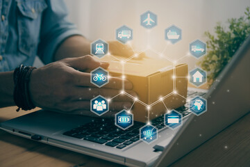 Hand of Casual Businessman Catch Parcel on Laptop and Blue Hexagonal Logistic Icon in Vintage Tone