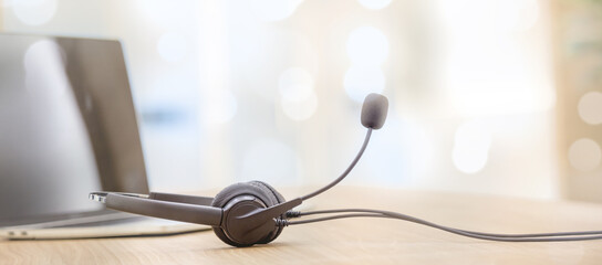 Headset and customer support equipment at call center service.