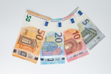 5, 10, 20, 50 euro banknotes. Money on white background